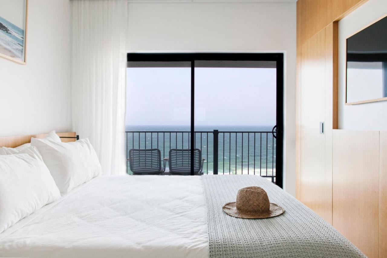 Pacific Hotel Ямба Екстериор снимка